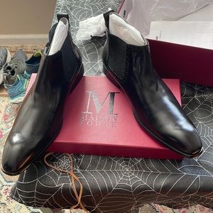 Black leather ankle boots, never worn.